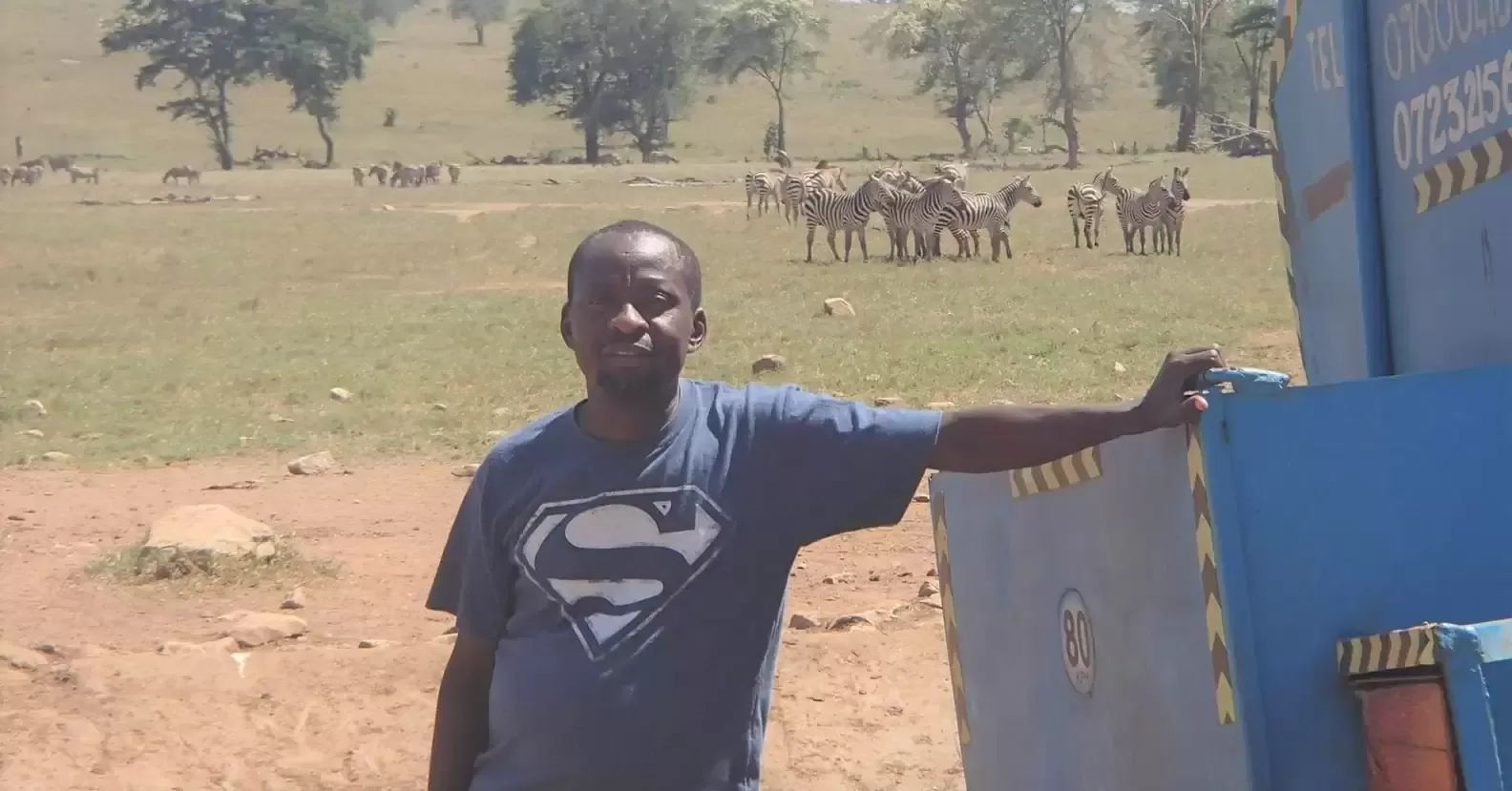 A man travels for hours daily through a drought to provide water for wild animals 11