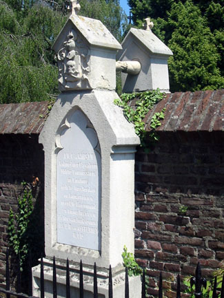 Graves holding hands over wall a Catholic woman and her Protestant husband 1